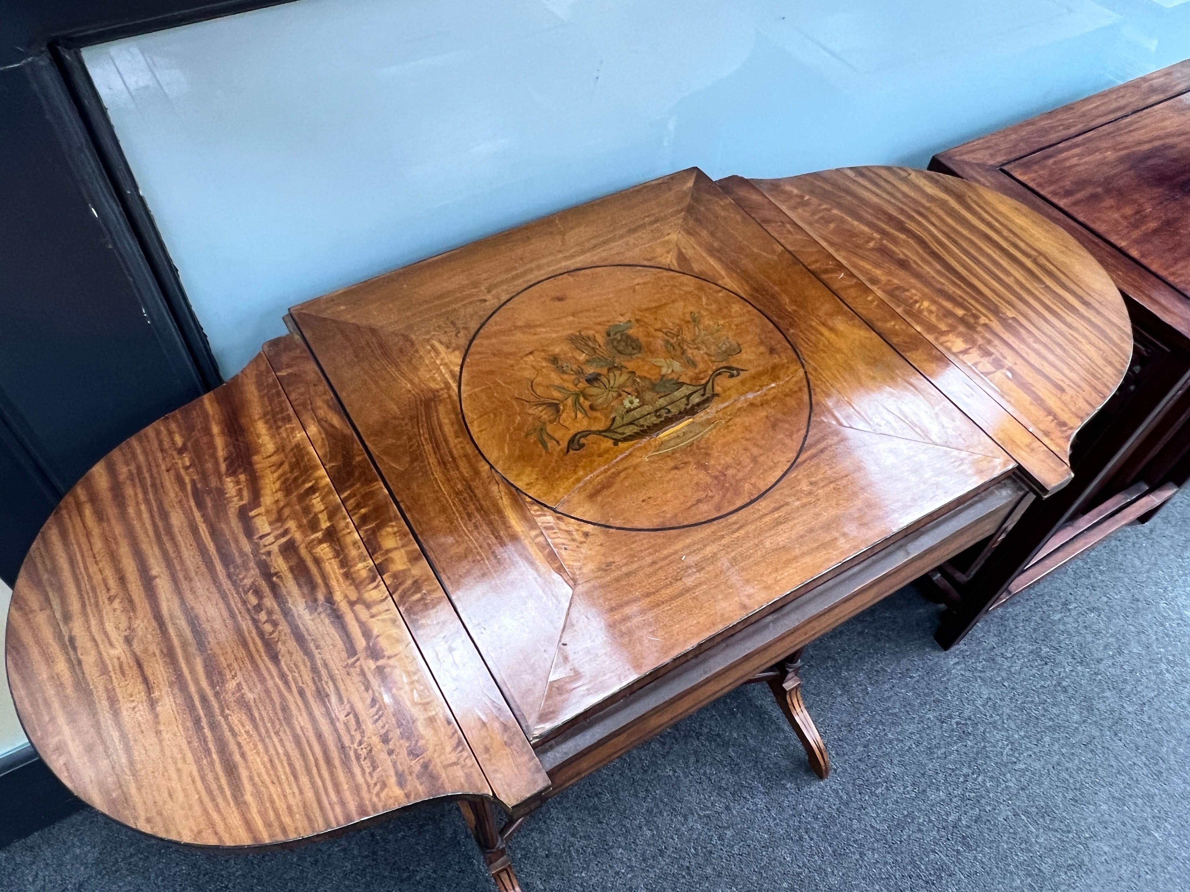 An Edwardian marquetry inlaid satinwood occasional table